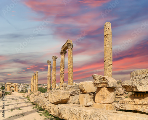 Roman ruins (against the background of a beautiful sky with clouds) in the Jordanian city of Jerash (Gerasa of Antiquity), capital and largest city of Jerash Governorate, Jordan #1140723265