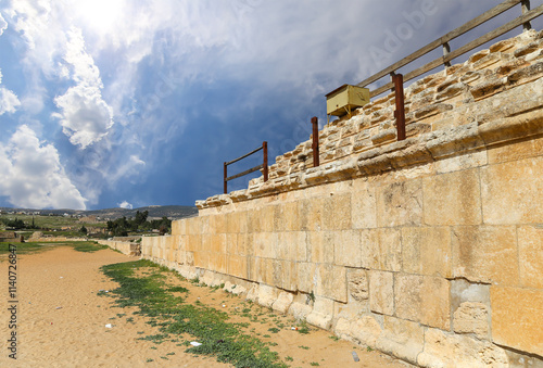 Roman ruins (against the background of a beautiful sky with clouds) in the Jordanian city of Jerash (Gerasa of Antiquity), capital and largest city of Jerash Governorate, Jordan #1140726847