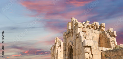 Roman ruins (against the background of a beautiful sky with clouds) in the Jordanian city of Jerash (Gerasa of Antiquity), capital and largest city of Jerash Governorate, Jordan #1140730020