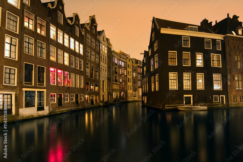 Buildings and architecture by the canal at Amsterdam city, Netherlands, Holland, cityscape background