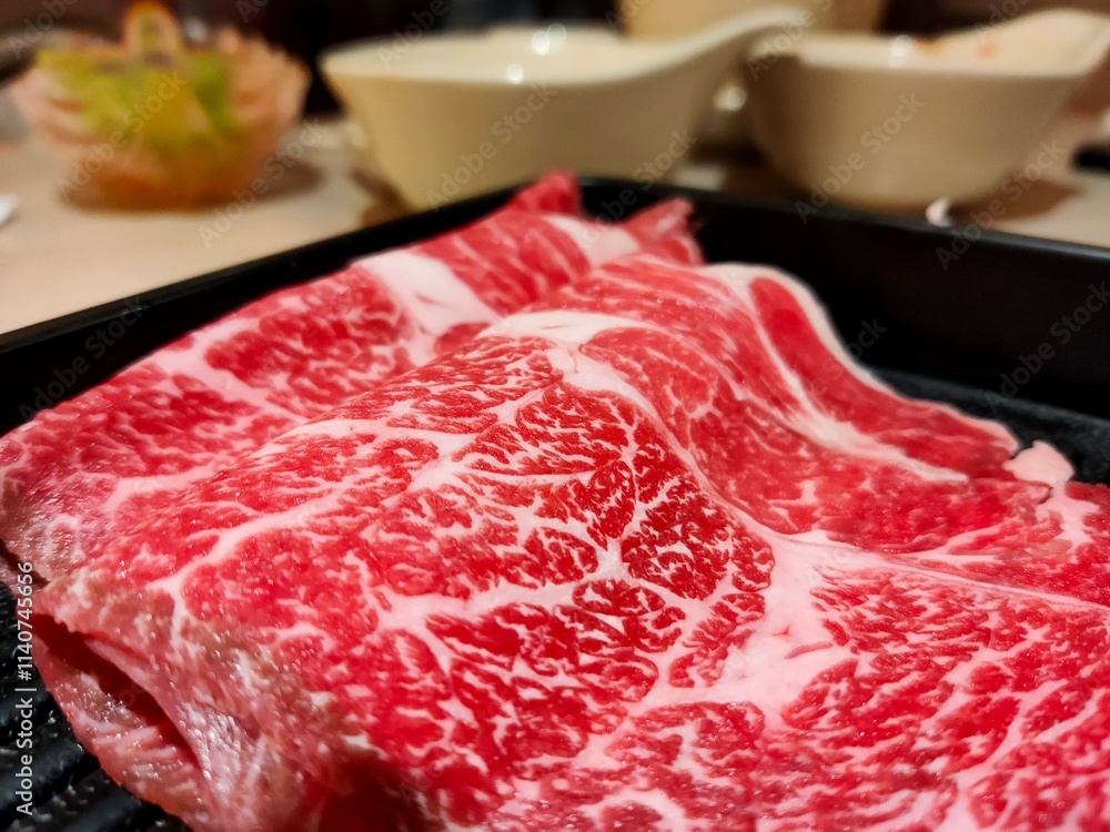 Shabu sliced meat, Marbled meat on plate Shabu sliced meat, Marbled meat on plate