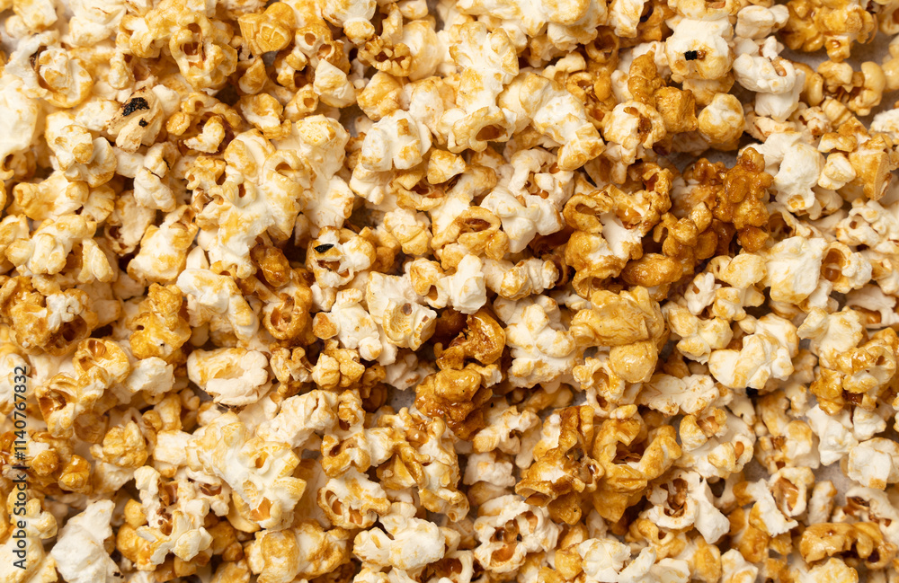Caramel Popcorn Texture - Close-Up of Sweet and Crunchy Snack. High-resolution Close-up Shot of Caramel-coated Popcorn. Caramel Popcorn Texture - Close-Up of Sweet and Crunchy Snack. High-resolution Close-up Shot of Caramel-coated Popcorn.