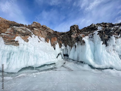 A white van is driving on a snowy road