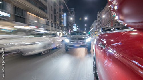 Fototapeta Naklejka Na Ścianę i Meble -  Car moves at fast speed at the night avenue timelapse hyperlapse drivelapse.