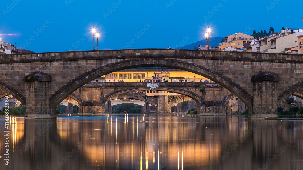Ponte Alla Carraia and Santa Trinita Holy Trinity Bridge day to night timelapse over River Arno in Florence Ponte Alla Carraia and Santa Trinita Holy Trinity Bridge day to night timelapse over River Arno in Florence