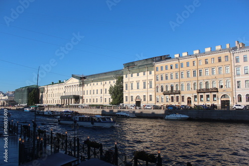 Singer Building, Hermitage Museum Building, Winter Palace, Alexander Column, Palace Square in St. Petersburg, Nevski Prospect, Neva River and tour boats, Peter Pavel Fortress. 
   St.Petersburg Russia