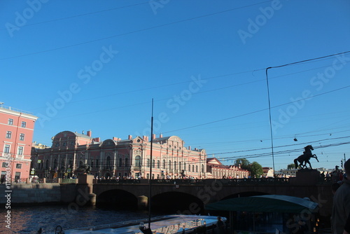 Singer Building, Hermitage Museum Building, Winter Palace, Alexander Column, Palace Square in St. Petersburg, Nevski Prospect, Neva River and tour boats, Peter Pavel Fortress. 
   St.Petersburg Russia