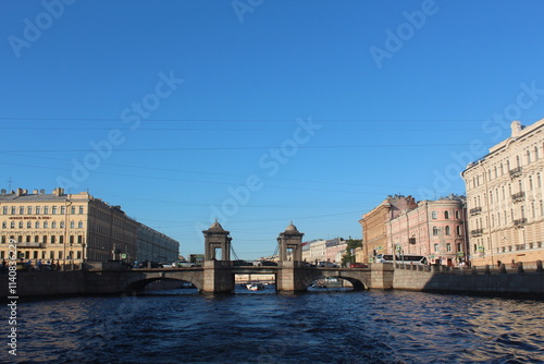 Singer Building, Hermitage Museum Building, Winter Palace, Alexander Column, Palace Square in St. Petersburg, Nevski Prospect, Neva River and tour boats, Peter Pavel Fortress. 
   St.Petersburg Russia