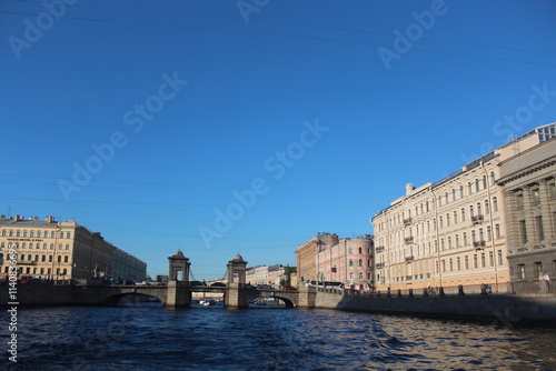 Singer Building, Hermitage Museum Building, Winter Palace, Alexander Column, Palace Square in St. Petersburg, Nevski Prospect, Neva River and tour boats, Peter Pavel Fortress. 
   St.Petersburg Russia
