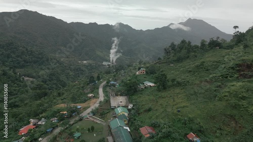 Mountain Village with Smoke in Background