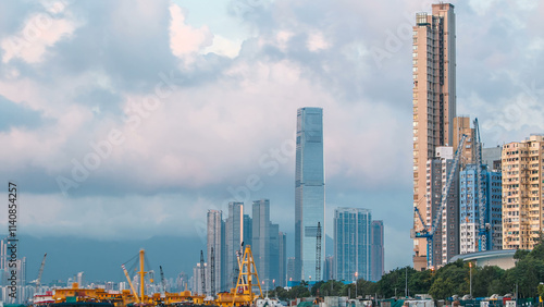 Photography Hong Kong business center timelapse with a cloudy blue sky before sunset