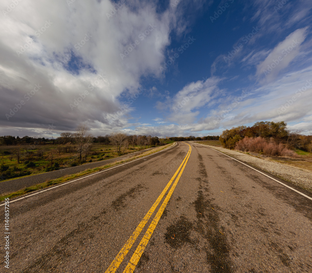 Fototapeta premium View or yellow lines in the middle of a levee road 