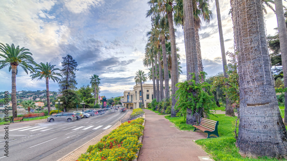 Evening view to palms on the center street of Beaulieu-sur-Mer timelapse hyperlapse. Evening view to palms on the center street of Beaulieu-sur-Mer timelapse hyperlapse.