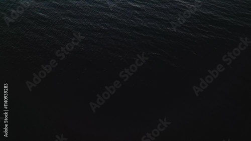 Revealing Drone Shot of the Ocean Tilting Up
