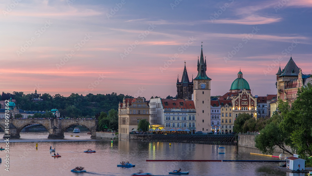 View of the city Prague in Czech Republic day to night timelapse on the Vltava river with beautiful sky View of the city Prague in Czech Republic day to night timelapse on the Vltava river with beautiful sky