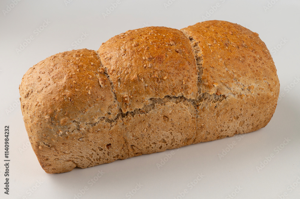 Generated imWhole wheat flour bread loaf with flaxseed isolated on white backgroundage Generated imWhole wheat flour bread loaf with flaxseed isolated on white backgroundage