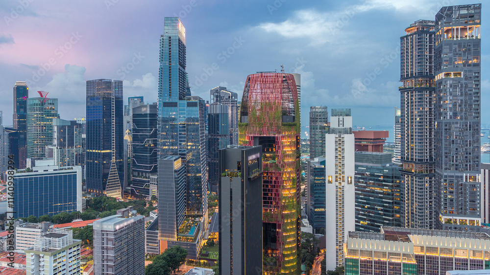 Fototapeta premium Aerial view of Chinatown and Downtown of Singapore day to night timelapse