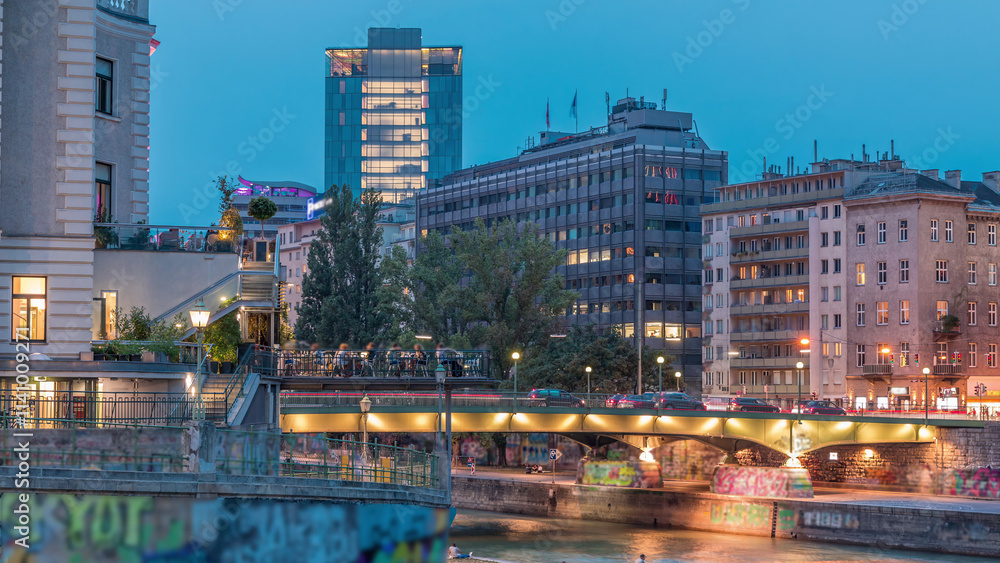 Fototapeta premium Vienna cityscape with the Danube channel day to night timelapse in Vienna. Austria.