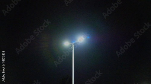 Faulty flickering LED Street lamp in a UK street. 