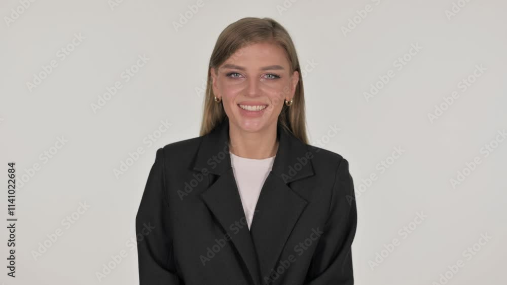 Portrait of Businesswoman Shaking Head in Acceptance on White Background Portrait of Businesswoman Shaking Head in Acceptance on White Background