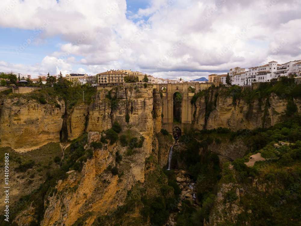 Fototapeta premium Aerial view of Ronda landscape and buildings with Puente Nuevo Bridge, Andalusia, Spain