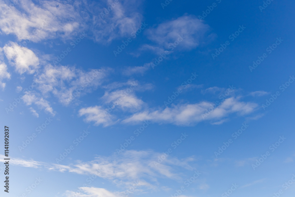 Fototapeta premium Bright Blue Sky with Light Wispy Clouds on a Clear Day