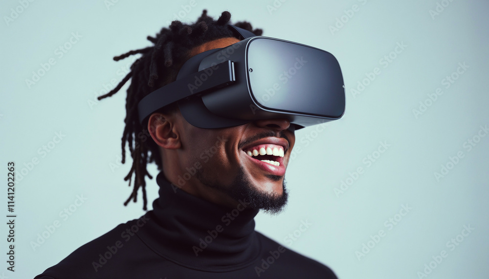 Smiling man wearing a modern virtual reality headset, immersed in a digital experience. The setup suggests personal enjoyment and tech innovation in augmented virtual environments.
Smiling man wearing a modern virtual reality headset, immersed in a digital experience. The setup suggests personal enjoyment and tech innovation in augmented virtual environments.