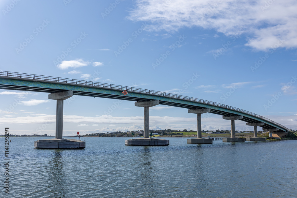 Obraz premium Part of the curved Hindmarsh Island bridge, a controversial curved road bridge connecting Goolwa and Hindmarsh Island over the Murray River in the Coorong on the Fleurieu Peninsula in South Australia.