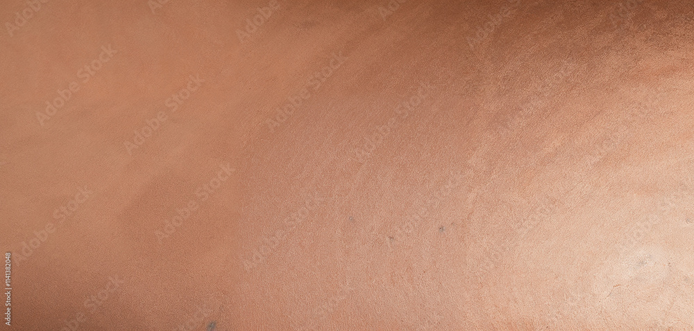 Fototapeta premium A close-up of luxurious satin fabric in a bronze shade, showcasing smooth folds, soft texture, and elegant shimmer, perfect for adding a touch of sophistication and glamour to any design.