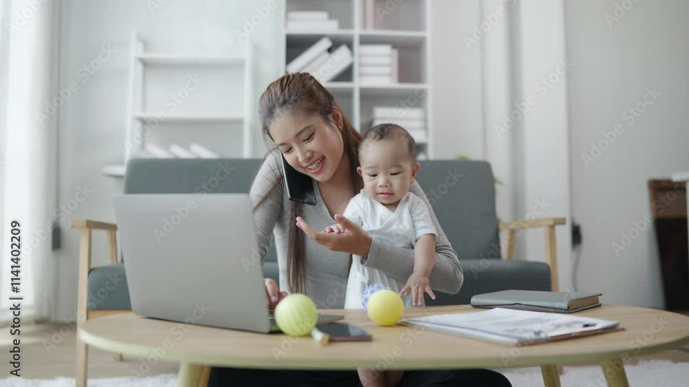 Remote working from home Mother talking to clients and colleague using laptop computer and document along with take off her baby. Remote working from home Mother talking to clients and colleague using laptop computer and document along with take off her baby.
