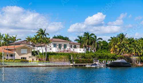 Hotel luxury building. Residential architecture. Modern building. Residential apartment in waterfront city. Waterfront landscape with house. Vacation building in summer. Luxury waterfront house