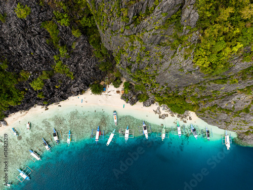 Aerial View of Tropical Beach with Traditional Boats in Palawan, Philippines