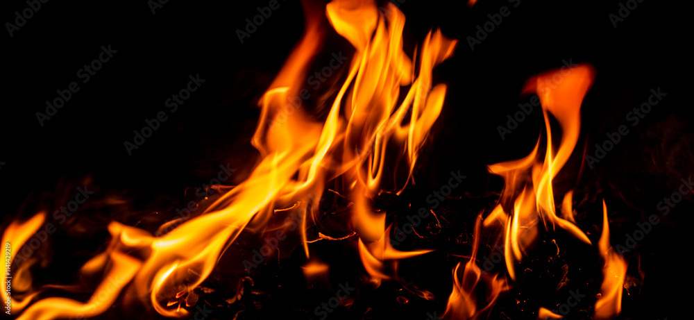 Fire flame background. Hell bonfire. Texture of fire on a black background. Blaze flames background for banner. Burning flames. Fire texture. Fire flame background. Hell bonfire. Texture of fire on a black background. Blaze flames background for banner. Burning flames. Fire texture.