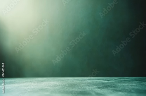 Dark green moody background with light beam and empty surface.