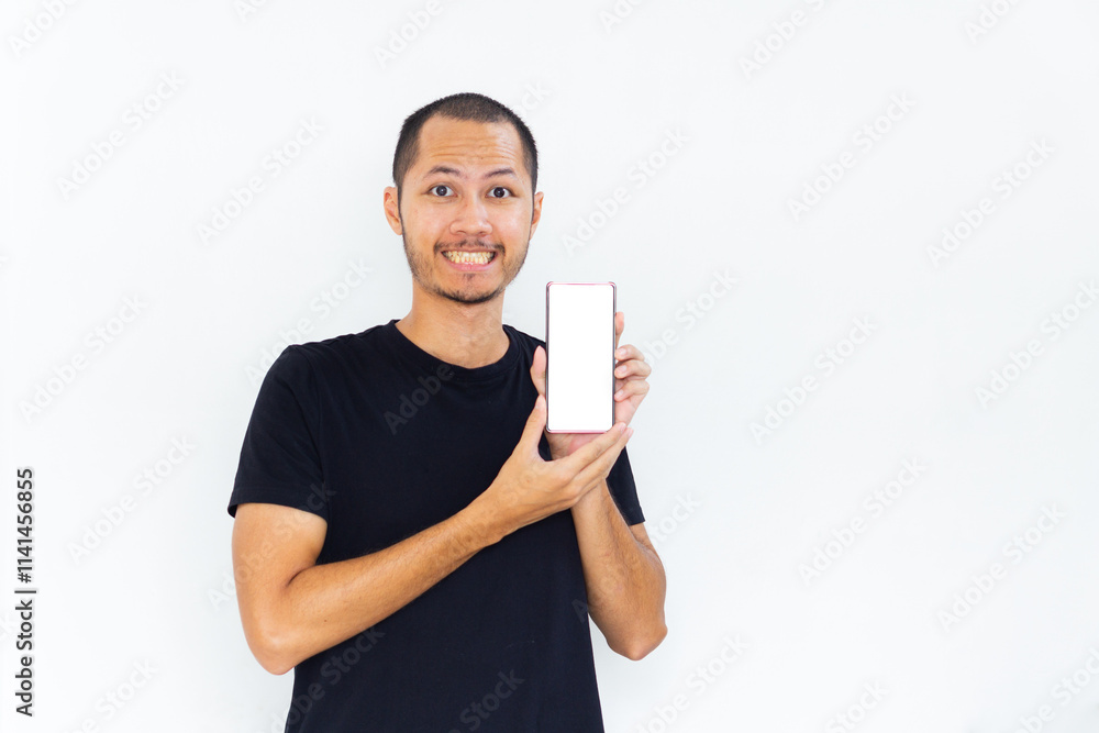 Men showing blank screen smartphone with black empty shirt on isolated white background Men showing blank screen smartphone with black empty shirt on isolated white background