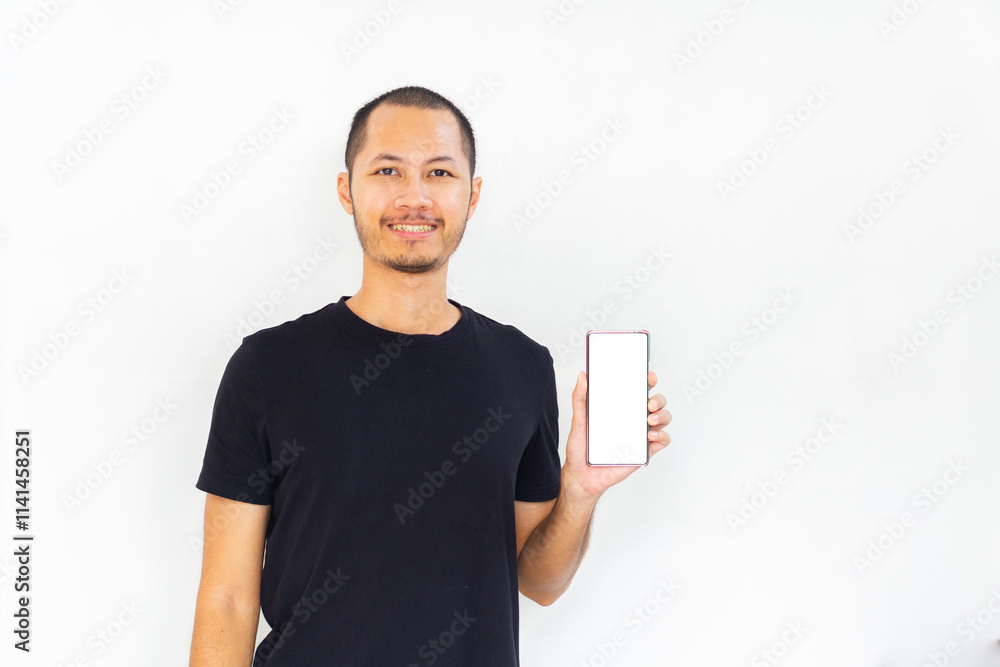 Men showing blank screen smartphone with black empty shirt on isolated white background Men showing blank screen smartphone with black empty shirt on isolated white background