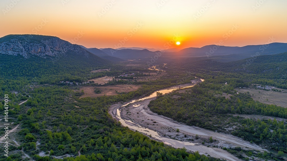 Fototapeta premium Stunning Aerial View of a Serene River at Sunset in a Scenic Landscape