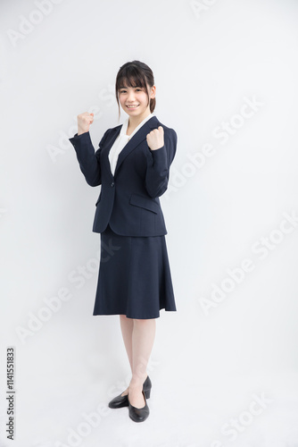 ガッツポーズをする女性 photo