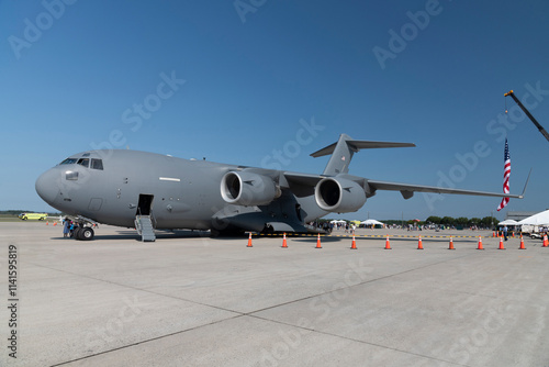U.S. Air Force C-17 Globemaster III under a clear blue sky.