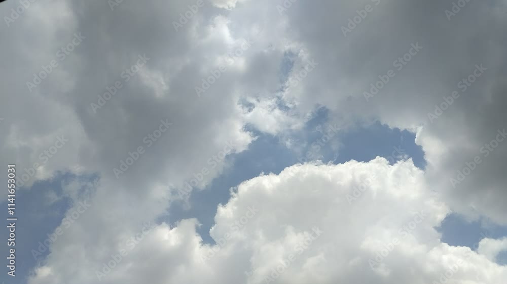 timelapse of clouds with a clear blue sky during the day. natural background timelapse of clouds with a clear blue sky during the day. natural background