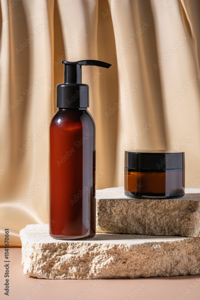 Premium skincare and body care cosmetics set displayed on textured stone podiums, highlighting minimalist design against a beige textile drapery backdrop. Premium skincare and body care cosmetics set displayed on textured stone podiums, highlighting minimalist design against a beige textile drapery backdrop.