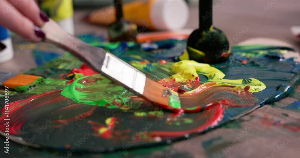 An Artists Palette Featuring a Variety of Vibrant Paints Alongside Essential Tools An Artists Palette Featuring a Variety of Vibrant Paints Alongside Essential Tools
