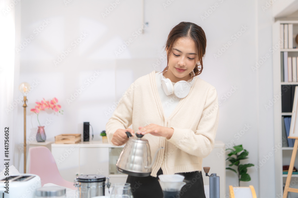 Asian young woman enjoying bread and coffee for breakfast at home, morning routine before work Asian young woman enjoying bread and coffee for breakfast at home, morning routine before work