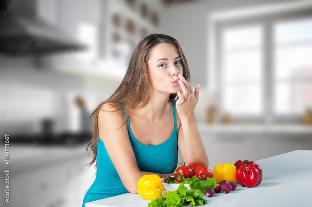 Portrait of beauty young woman cooking healthy food Portrait of beauty young woman cooking healthy food