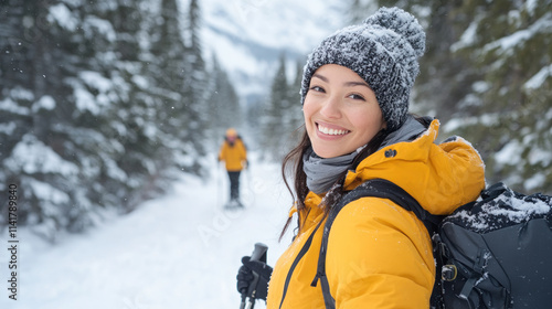 Canadian women snowshoeing together in winter at Banff National Park Canada