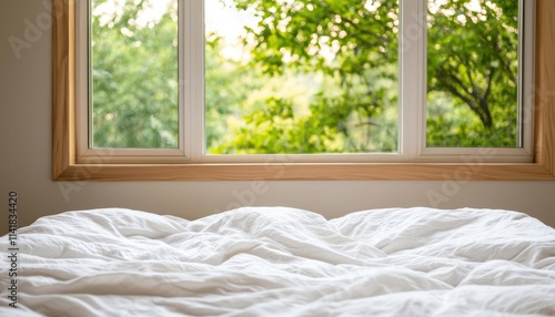 A cozy bed with fresh linens and an open window letting in natural light and fresh air for restorative sleep, burnout recovery stress rest, refreshing recovery space photo