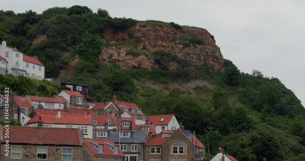 wide shot of the houses and Cliff at runswick bay wide shot of the houses and Cliff at runswick bay