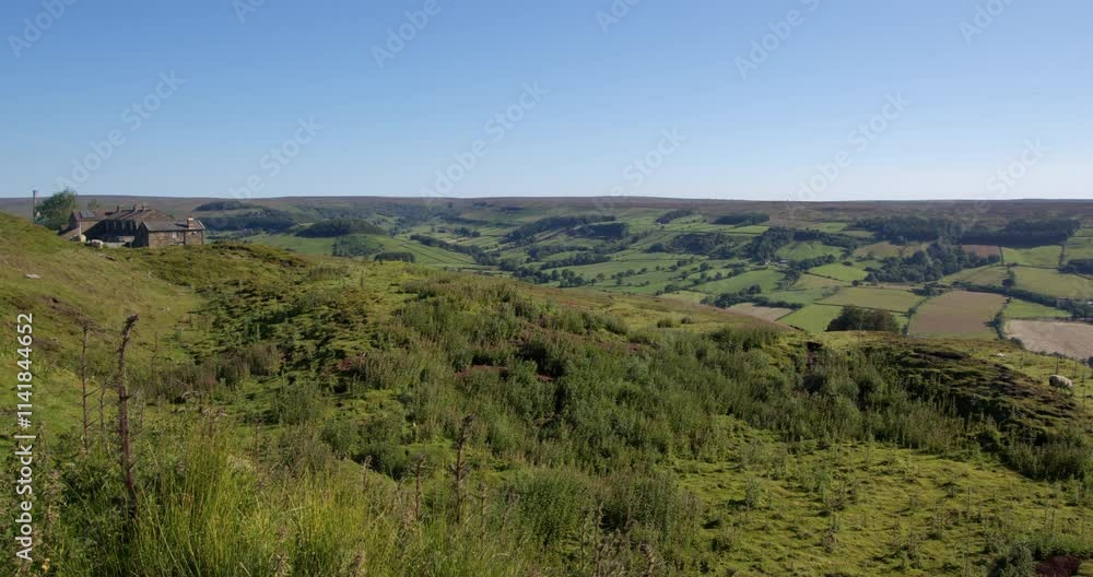 wide shot looking north across industrial wasteland and farm buildings at Spaunton moor by Rosedale abbey wide shot looking north across industrial wasteland and farm buildings at Spaunton moor by Rosedale abbey