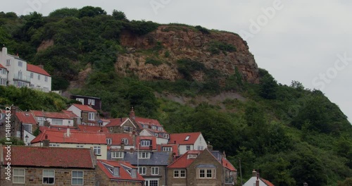 wide shot of the houses and Cliff at runswick bay photo