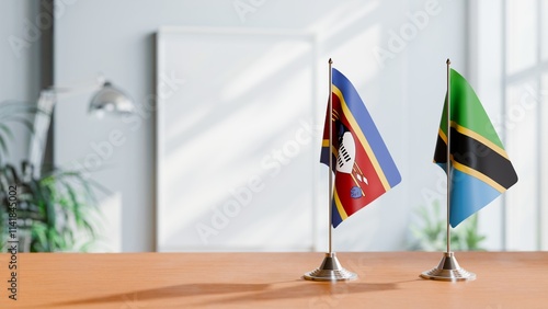 FLAGS OF SWAZILAND AND TANZANIA ON TABLE